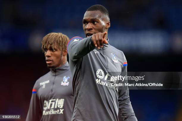 Christian Benteke and Wilfried Zaha of Crystal Palace during the Premier League match between Chelsea and Crystal Palace at Stamford Bridge on March...
