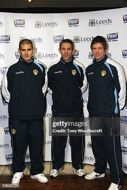 Football players Bradley Johnson, Richard Naylor and Leigh Bromby of Leeds United attend the ceremony to switch on the Leeds Christmas Lights on...