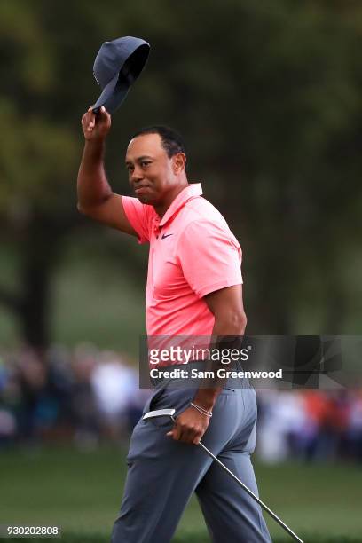 Tiger Woods reacts after finishing his third round of the Valspar Championship at Innisbrook Resort Copperhead Course on March 10, 2018 in Palm...