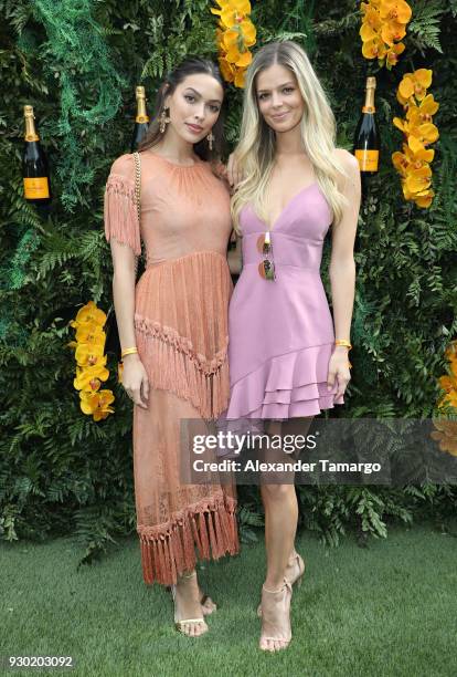 Melody de la Fe and Danielle Knudson are seen at the Veuve Clicquot Fourth Annual Clicquot Carnaval Supporting the Perez Art Museum Miami at Museum...