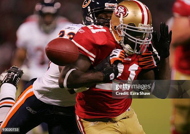 Frank Gore of the San Francisco 49ers fumbles the ball but the 49ers recover it in the second half against the Chicago Bears at Candlestick Park on...