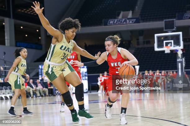 Western Kentucky Lady Toppers guard Sidnee Bopp is guarded by UAB Blazers forward Imani Johnson during the Conference USA Women's Basketball...