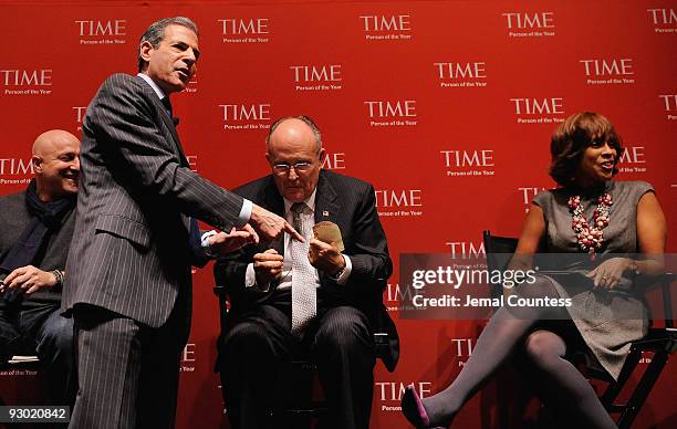 Chef Tom Colicchio, Managing editor for Time Richard Stengel, former New York mayor Rudy Giuliani and editor of O Magazine Gayle King speak at the...