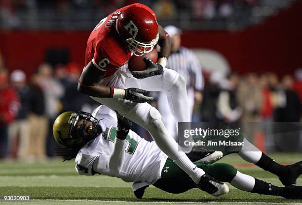 Mohamed Sanu of the Rutgers Scarlet Knights makes a catch against Jerome Murphy of the South Florida Bulls at Rutgers Stadium on November 12, 2009 in...