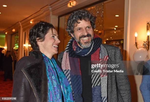 Julia Bremermann and Pasquale Aleardi attend the premiere 'Der Entertainer' on March 10, 2018 in Berlin, Germany.