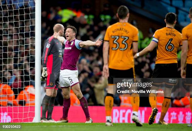 James Chester of Aston Villa scores for Aston Villa during the Sky Bet Championship match between Aston Villa and Wolverhampton Wanderers at Villa...