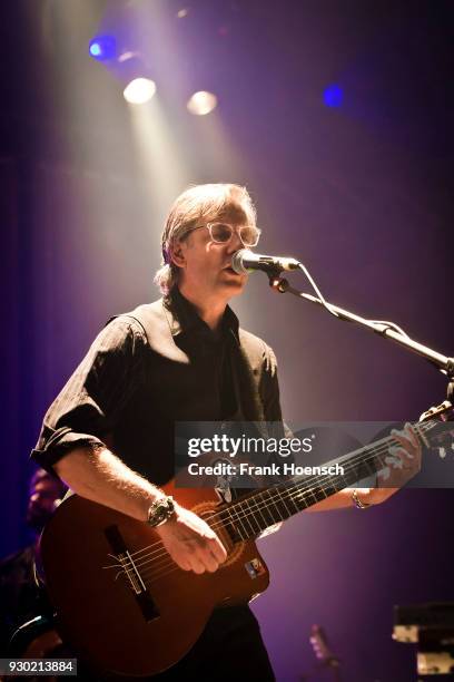 Singer Joey Burns of the American band Calexico performs live on stage during a concert at the Tempodrom on March 10, 2018 in Berlin, Germany.