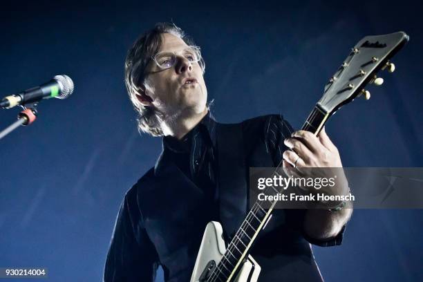 Singer Joey Burns of the American band Calexico performs live on stage during a concert at the Tempodrom on March 10, 2018 in Berlin, Germany.