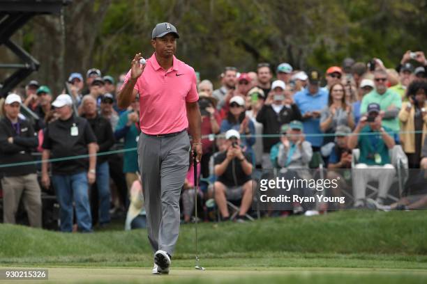 Tiger Woods acknowledges the crowd during the third round of the Valspar Championship at Innisbrook Resort on March 10, 2018 in Palm Harbor, Florida.