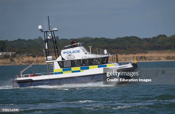 Southampton Water Hampshire England UK, The Hampshire Constabulary boat Commander travelling at speed.