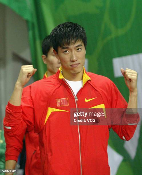 Liu Xiang of China celebrates during an award ceremony of the men's 110m hurdles of 18th Asian Athletics Championships at Guangzhou Olympic Sports...