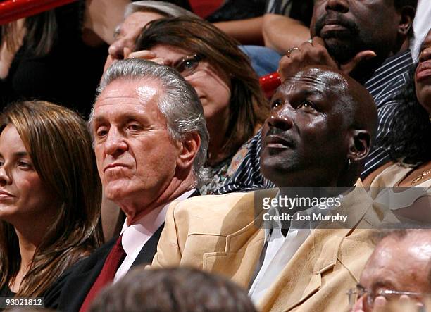 Pat Riley, President of Basketball Operations of the Miami Heat sits with Hall of famer Michael Jordan on November 12, 2009 at American Airlines...