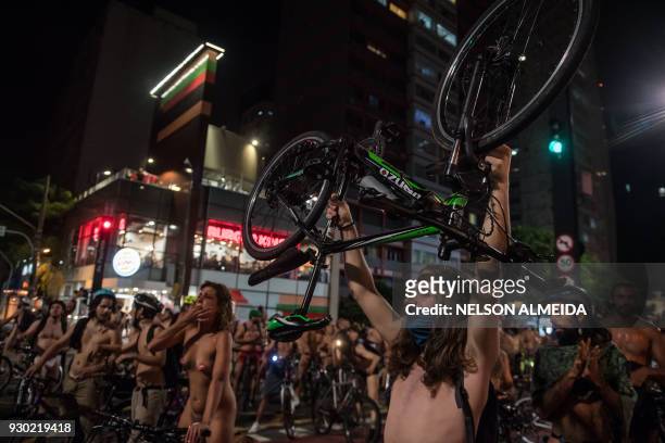 Graphic content / Naked cyclists demonstrate along Paulista Avenue in Sao Paulo, Brazil, to demand better condition of the city roads and to raise...