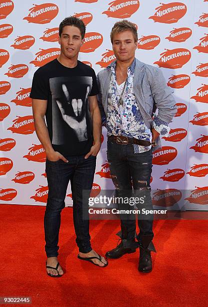 Musician and former Neighbours actor Dean Geyer and Neighbours actor Sam Clark arrive for the Australian Nickelodeon Kids' Choice Awards 2009 at...