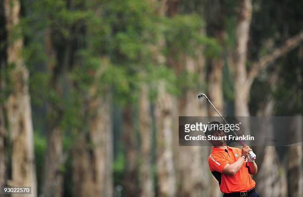 Yang of Korea plays his approach shot on the seventh hole during the second round of the UBS Hong Kong Open at the Hong Kong Golf Club on November...