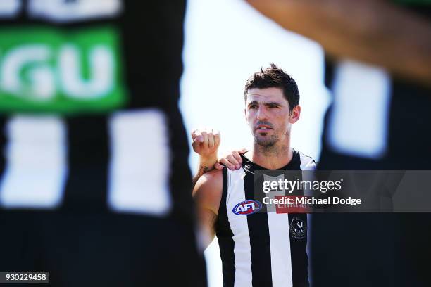 Scott Pendlebury of the Magpies speaks to teammates during the JLT Community Series AFL match between Collingwood Magpies and the Western Bulldogs at...