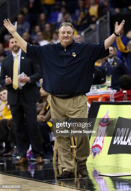 Head coach Bob Huggins of the West Virginia Mountaineers reacts as the Kansas Jayhawks defeat the Mountaineers 81-70 to win the Big 12 Basketball...