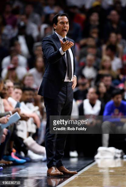 Erik Spoelstra of the Miami Heat yells during the first half of the game against the Washington Wizards at the American Airlines Arena on March 10,...