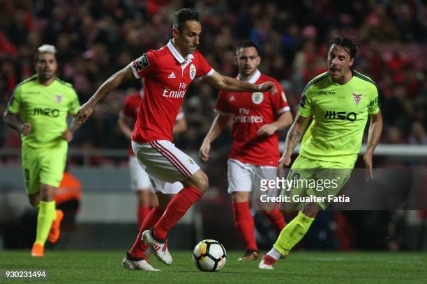 Benfica forward Jonas from Brazil with CD Aves midfielder Vitor Gomes from Portugal in action during the Primeira Liga match between SL Benfica and...