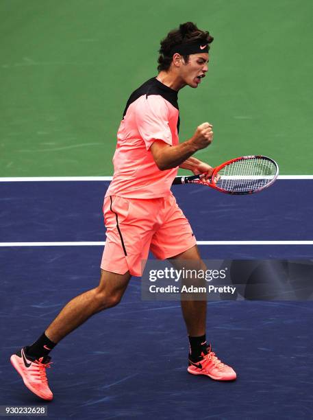 Taylor Fritz of the USA celebrates victory after his match against Andrey Rublev of Russia during the BNP Paribas Open at the Indian Wells Tennis...