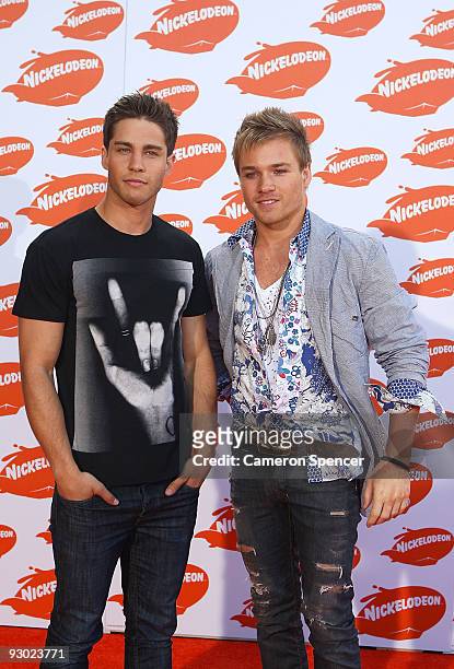 Musician and former Neighbours actor Dean Geyer and Neighbours actor Sam Clark arrive for the Australian Nickelodeon Kids' Choice Awards 2009 at...