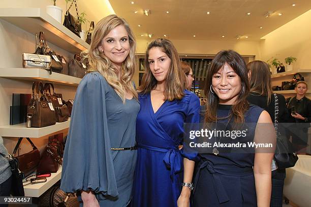 Analise Peterson, Minnie Mortimer and Anita Ko attend Platine Pop-Up Bakery and Anya Hindmarch Girl's Tea to Benefit CoachArt on November 12, 2009 in...