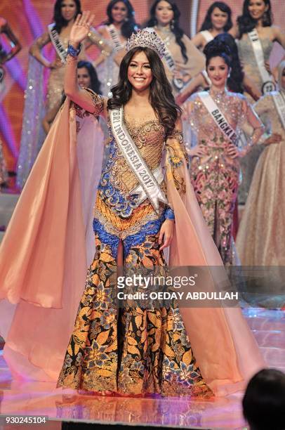 This picture taken on March 9, 2018 shows actress and Miss Indonesia 2017 Bunga Jelitha during the finals of the 2018 Miss Indonesia beauty pageant...