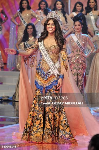 This picture taken on March 9, 2018 shows actress and Miss Indonesia 2017 Bunga Jelitha during the finals of the 2018 Miss Indonesia beauty pageant...