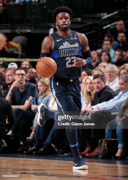 Wesley Matthews of the Dallas Mavericks handles the ball against the Memphis Grizzlies on March 10, 2018 at the American Airlines Center in Dallas,...