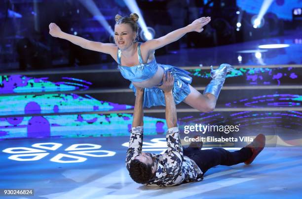 Pro Surfer Francisco Porcella and his dance partner Anastasia Kuzmina perform on the Italian TV show 'Ballando Con Le Stelle' at RAI Auditorium on...