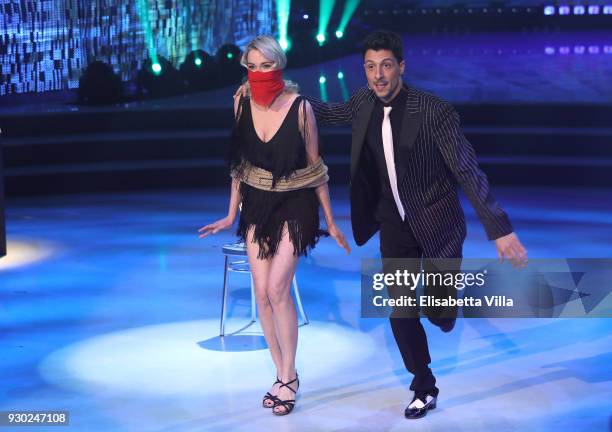 Italian actress Stefania Rocca and her dance partner Marcello Nuzio performs on the Italian TV show 'Ballando Con Le Stelle' at RAI Auditorium on...