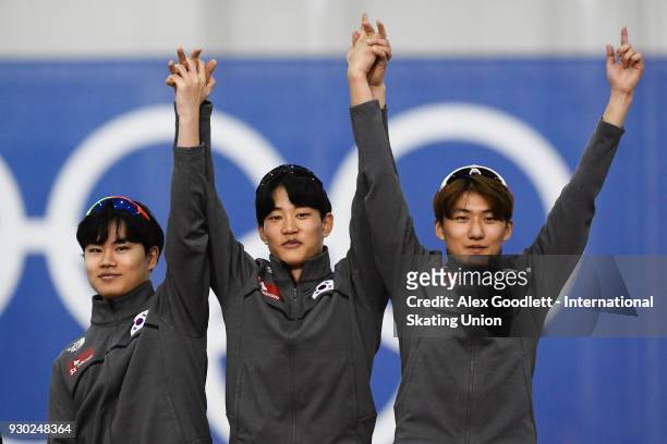 Seong-Hyeon Park, Jae-Woong Chung and Min-Seok Kim of Korea celebrate after winning the men's team sprints final during the World Junior Speed...