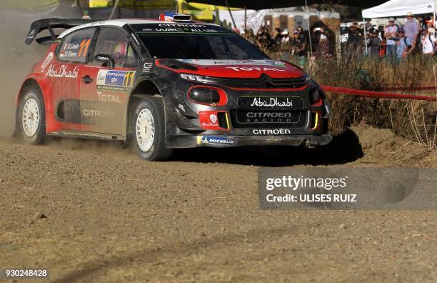 French driver Sebastien Loeb and co-driver Monegasque Daniel Elena steer their Citroen C3 during the second day of the 2018 FIA World Rally...