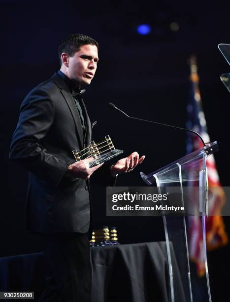 Heroes of the 2017 Las Vegas Shooting and Muhammed Ali Celebrity Fight Night Award Recipient Officer Tom McGrath speaks onstage at Celebrity Fight...