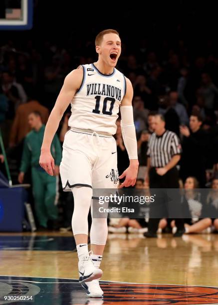 Donte DiVincenzo of the Villanova Wildcats celebrates the win at the buzzer during the championship game of the Big East Basketball Tournament at...