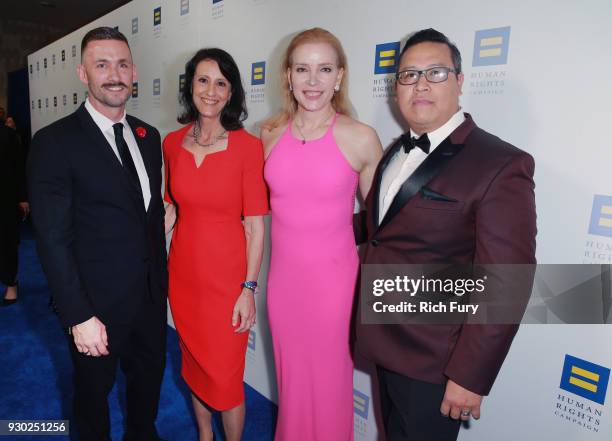 Event co-chair Christopher Boone, Gwen Baba, HRC Foundation board of directors, event co-chair Jessica Blair and event co-chair Nam Lam attend The...