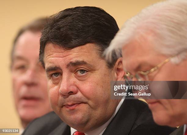 Sigmar Gabriel , new Chairman designate of the German Social Democratic Party , outgoing Chairman Franz Muentefering and SPD Bundestag faction leader...