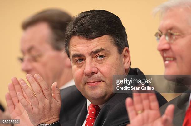 Sigmar Gabriel , new Chairman designate of the German Social Democratic Party , outgoing Chairman Franz Muentefering and SPD Bundestag faction leader...