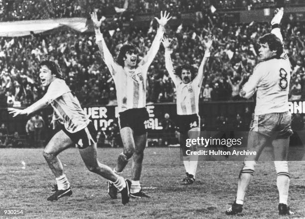 Argentina players celebrate as they score a goal during the FIFA World Cup Finals match against Hungary played at the Estadio Monumental, in Buenos...