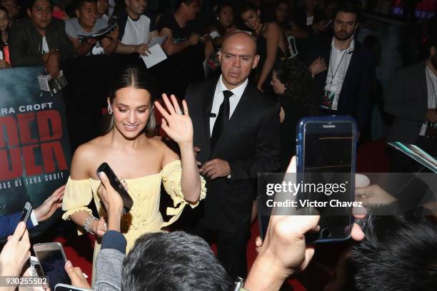 Actress Alicia Vikander signs autographs and takes selfies with fans during the "Tomb Raider" Mexico City premiere at Oasis Coyoacan on March 10,...