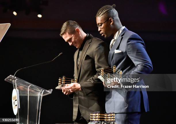 Heroes of the 2017 Las Vegas Shooting and Muhammed Ali Celebrity Fight Night Award Recipients Officers Tom McGrath and Jonathan Smith speaks onstage...