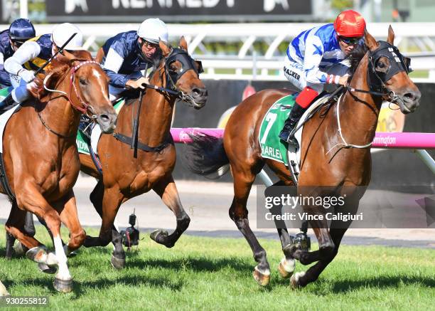 Michael Walker riding Harlem defeats Mark Zahra riding Gailo Chop and Damien Oliver riding Almandin in Race 8, TAB Australian Cup during Melbourne...