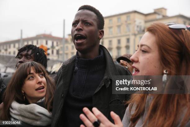 Some people during the demonstration that took place in Naples against racism and for Idy Diene, a Senegalese street vendor killed in Florence.