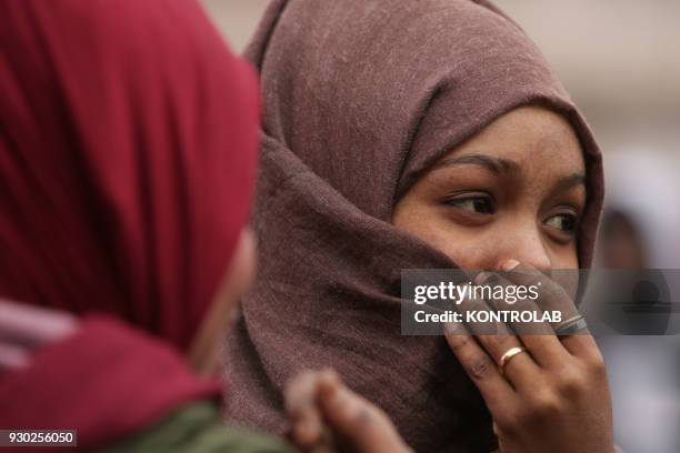 Woman during the demonstration that took place in Naples against racism and for Idy Diene, a Senegalese street vendor killed in Florence.