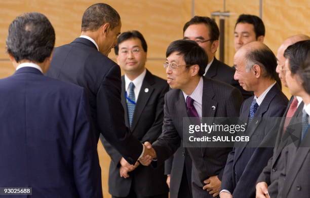 President Barack Obama greets senior Japanese officials prior to meetings with Japanese Prime Minister Yukio Hatoyama , at Kantei, the Prime...