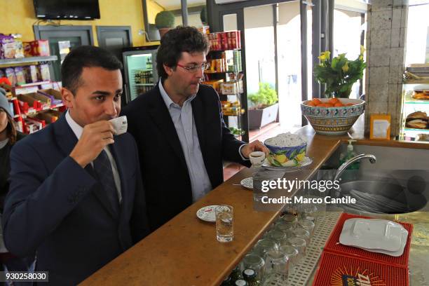 Luigi Di Maio, one of the leaders of the italian political Movement 5 Stars, hold a cup of coffee at the bar before a political meeting.