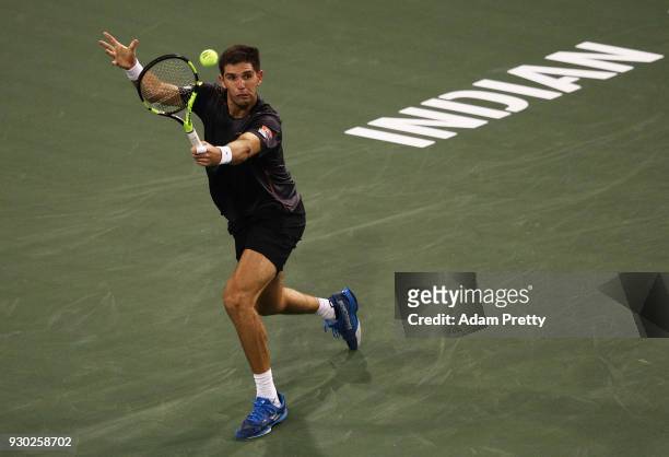 Federico Delbonis of Argentina hits a backhand during his match against Roger Federer of Switzerland during the BNP Paribas Open at the Indian Wells...
