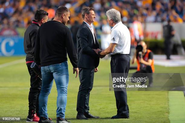 Diego Cocca, coach of Tijuana and Ricardo Ferretti, coach of Tigres shake hands during the 11th round match between Tigres UANL and Tijuana as part...