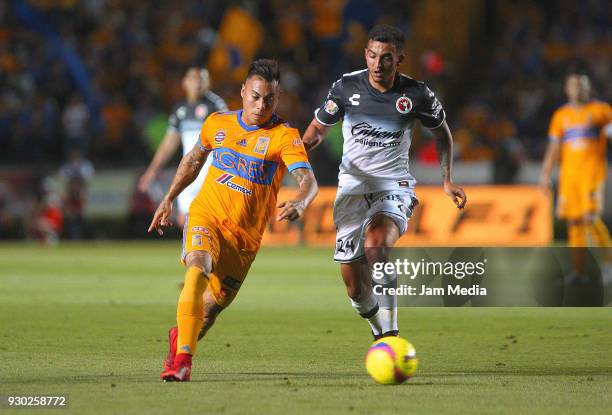 Victor Sosa of Tigres and Luis Chavez of Tijuana during the 11th round match between Tigres UANL and Tijuana as part of the Torneo Clausura 2018 Liga...