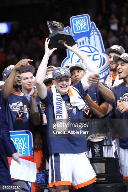 Kyle Guy of the Virginia Cavaliers celebrates after being named tournament MVP after defeating the North Carolina Tar Heels 71-63 during the...